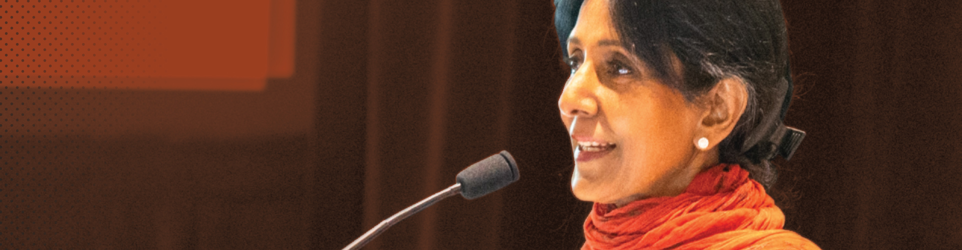 Wide-format banner cropped from the Researching Law newsletter cover, showing a speaker at a podium against a warm brown background with ABF brand graphic elements